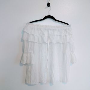 Off the shoulder ruffle bodice top with flared sleeve. White pure size tags remo